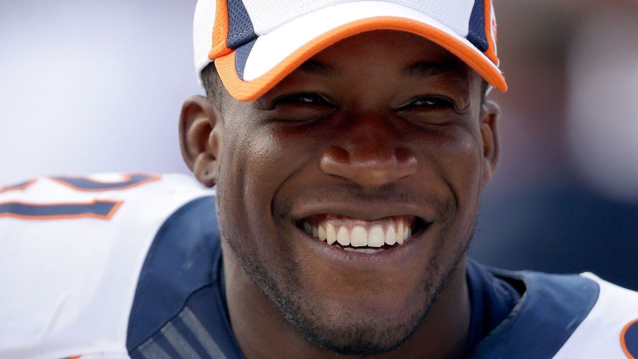 A Salute to Service military logo is seen on the helmet of Denver Broncos'  Ronnie Hillman before the start of an NFL football game against the  Indianapolis Colts, Sunday, Nov. 8, 2015